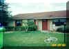 A picture of the front of our home made into a button graphic. (1870 bytes)